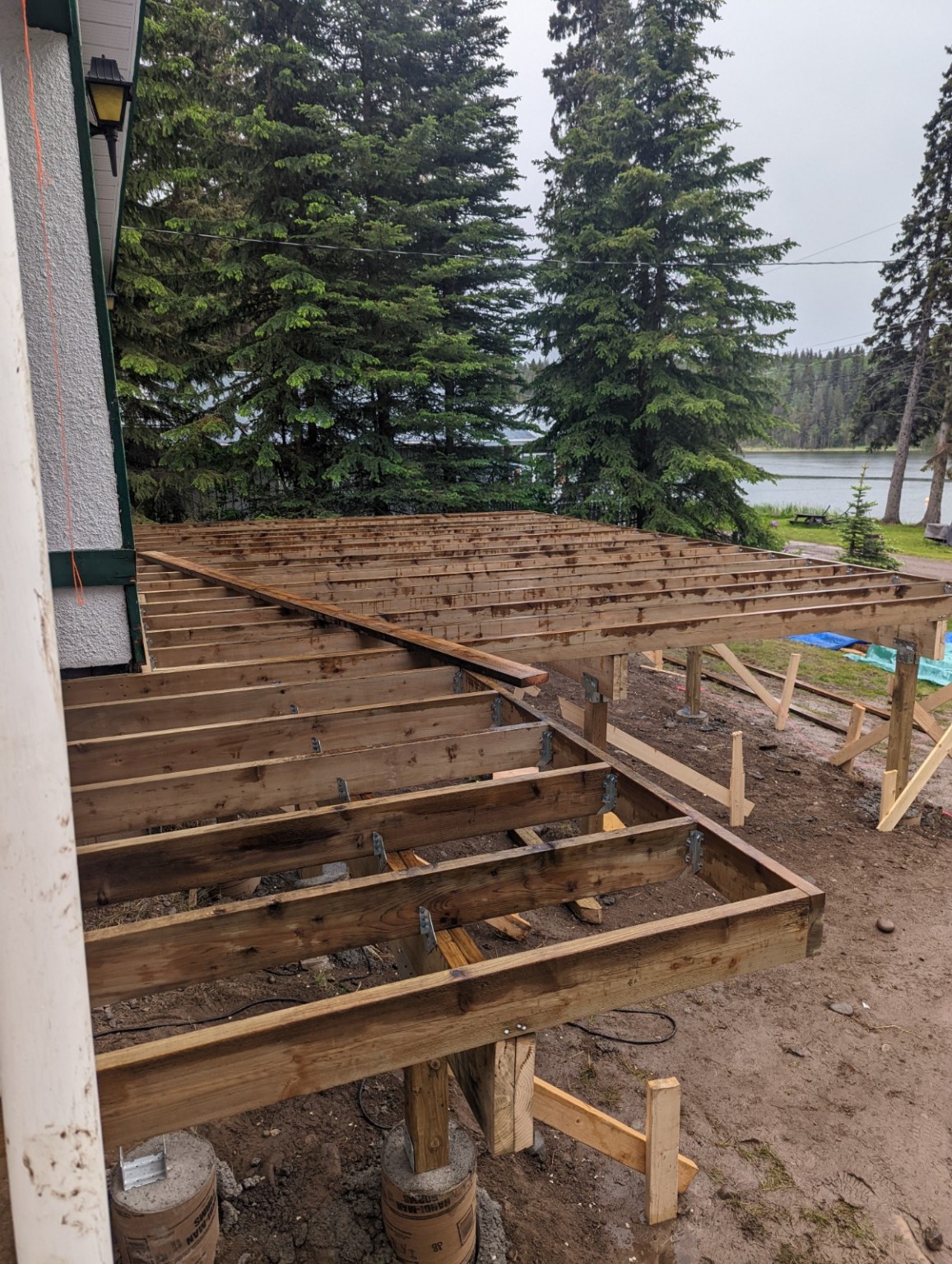 Wood framing and supports during construction of the lakefront deck